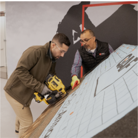 GAF employee teaching new roofer
