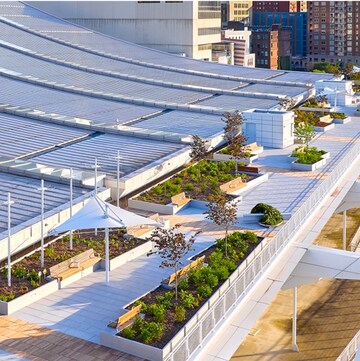 Overburden solutions: rooftop amenity space with landscaping and city view