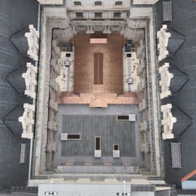 Overhead view of the New York State Capitol's intricate roof structure and central courtyards.