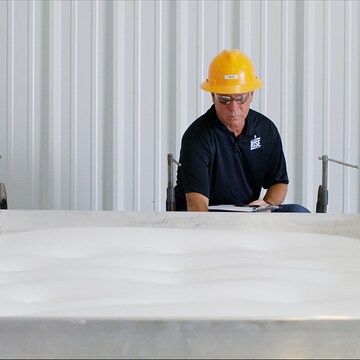 Engineer or worker checking green roof specifications