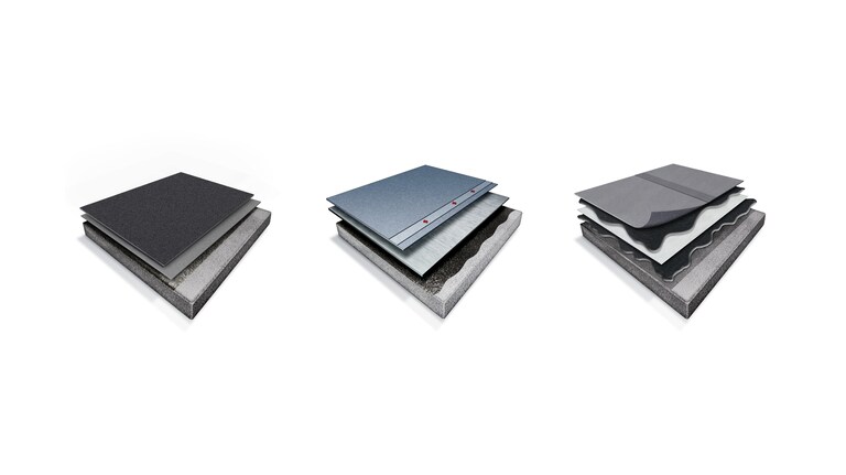 Close-up of three stacked samples illustrating the integrated layers of a roofing system, emphasizing waterproofing components